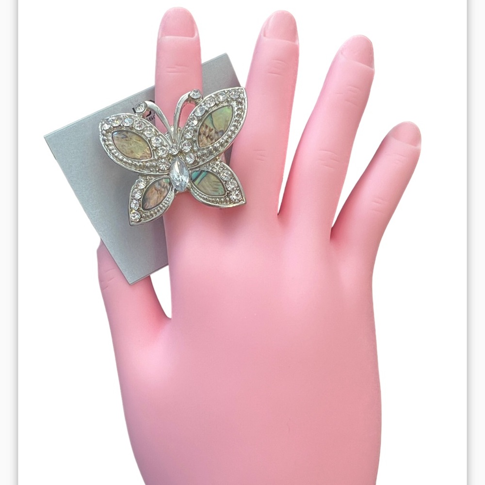 Lux silver toned crystal and iridescent butterfly stretch ring.